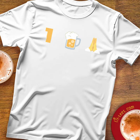 White t-shirt with a 1 Beer Please emoji graphic graphic on a bar table