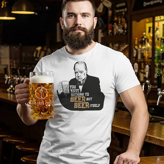 Man holding a beer mug in a bar wearing a Winston Churchill T-Shirt with txt saying 'You have nothing to beer but beer itself'