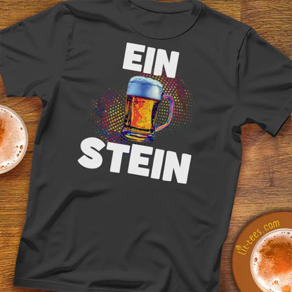 Black t-shirt with 'EIN STEIN' design featuring a colorful mug on a wooden bar table
