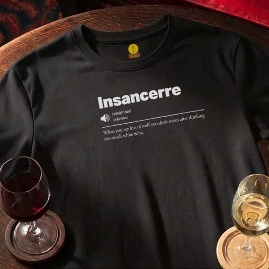 Black t-shirt with 'Insancerre' definition text, wine glasses on a wooden bar table.
