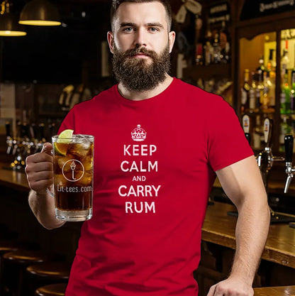 Man wearing a red t-shirt with 'Keep Calm and Carry Rum' text, holding a drink in a bar setting.