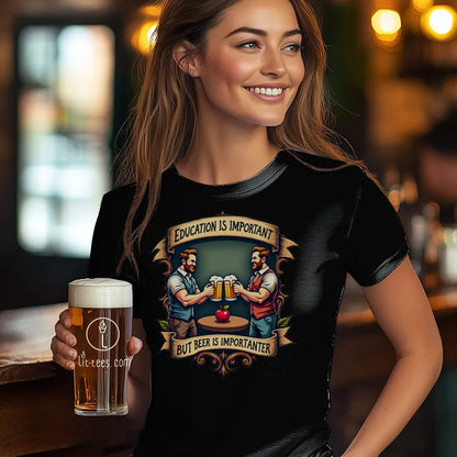 Woman wearing a black t-shirt with a humorous design 'Education is important but beer is importanter' holding a beer in a bar setting.