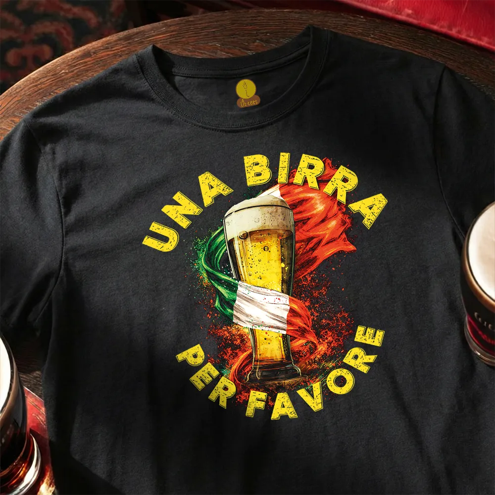 Black t-shirt with a beer graphic and text on a wooden surface. 1 beer please in Italian: Una birra, per favore