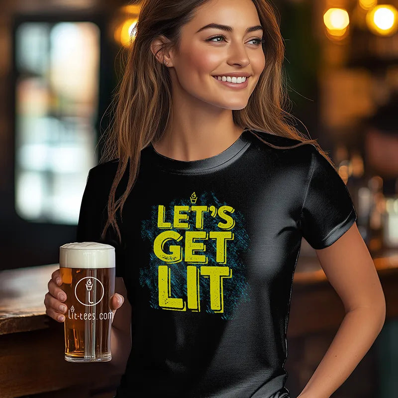 Woman wearing a black t-shirt with 'LET'S GET LIT' text, holding a beer in a bar setting.