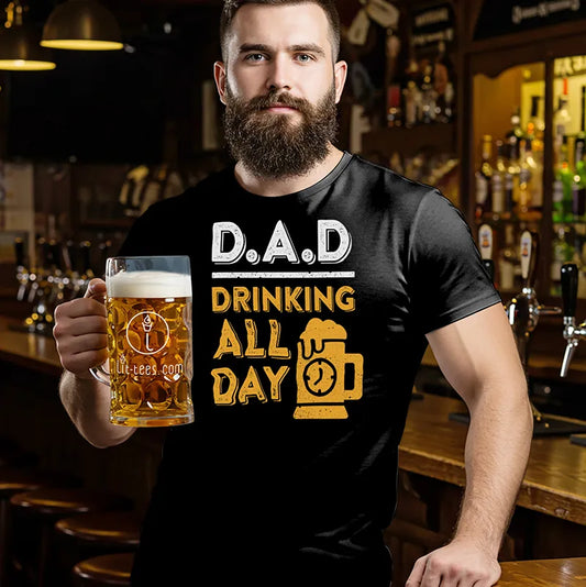 Man holding a beer mug wearing a black t-shirt with 'DAD Drinking All Day' text in a bar setting.