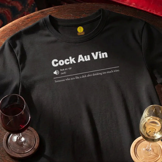 Black t-shirt with 'Cock Au Vin' text, wine glasses on a wooden bar table